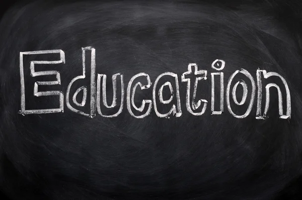 Education written on a blackboard — Stock Photo, Image