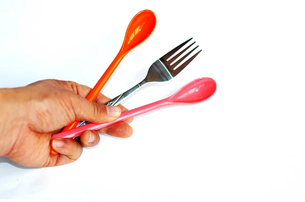 Cucchiai e forchette in mano — Foto Stock