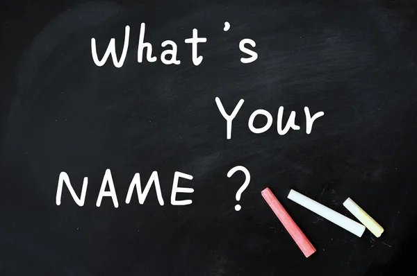 Wat is uw naam geschreven op een schoolbord — Stockfoto