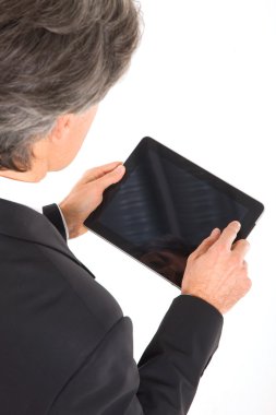 Businessman with tablet clipart