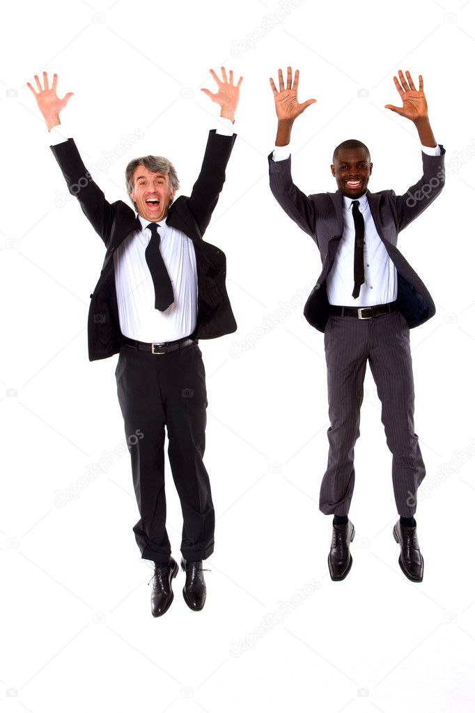 Two businessmen jumping