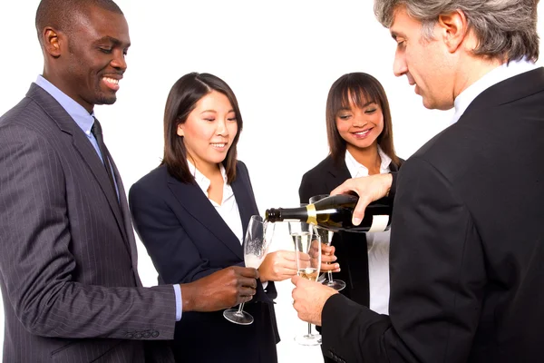 Multi-ethnic team toasting — Stock Photo, Image