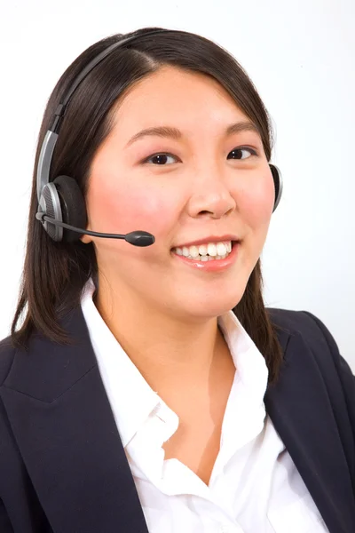 Mujer de negocios con micrófono para auriculares —  Fotos de Stock
