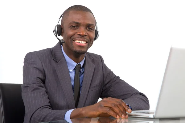 Businessman with headset microphone — Stock Photo, Image