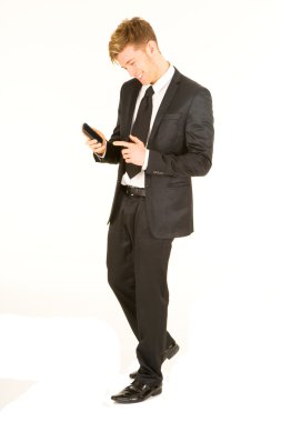 Businessman with smartphone clipart