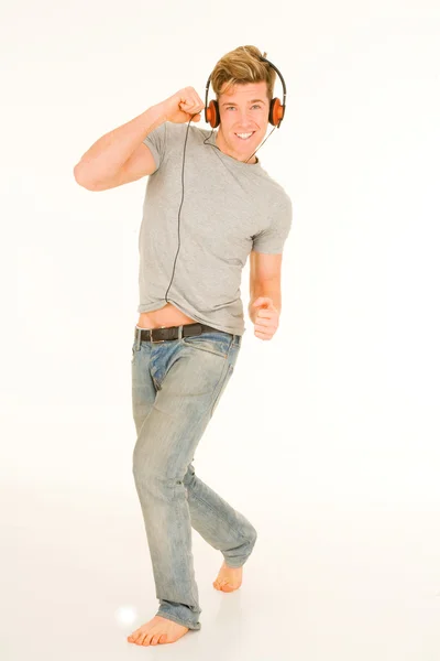 Fiatal férfi tánc fejhallgató — Stock Fotó