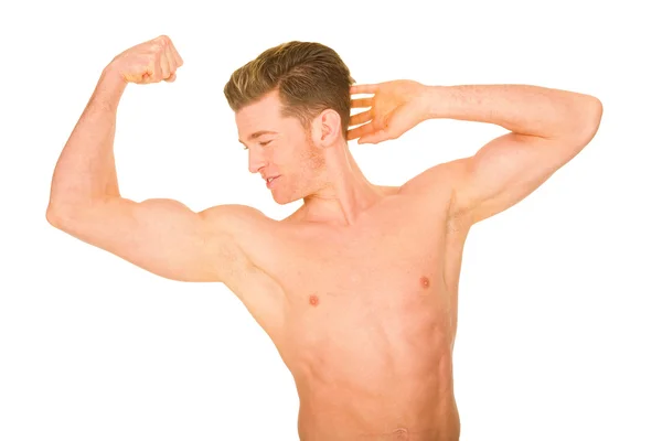 Uomo a petto nudo mostrando muscoli — Foto Stock