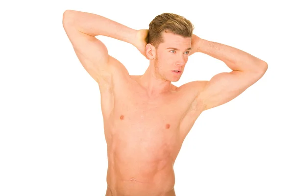 Hombre de pecho desnudo mostrando músculos — Foto de Stock