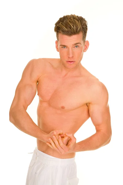 Bare-chested man showing muscles — Stock Photo, Image