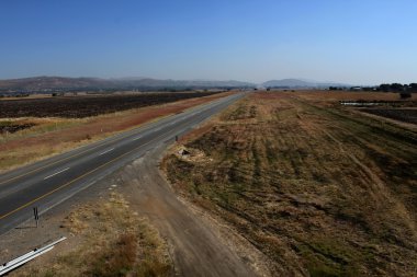 Open Freeway with Sand Road Junction