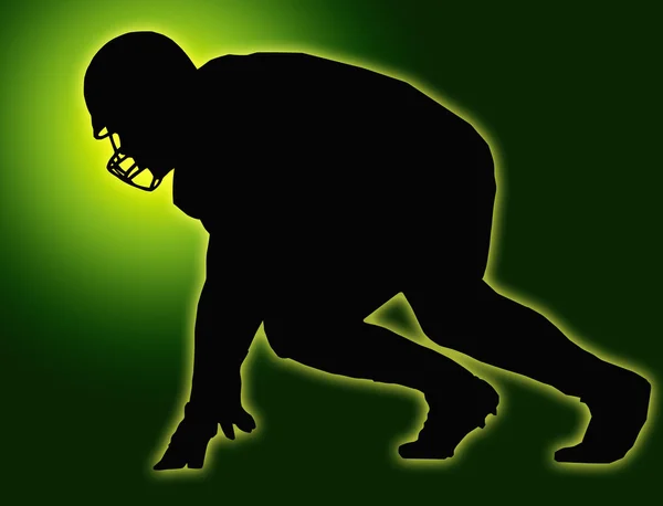 Groene gloed silhouet Amerikaans voetbal speler scrimmage — Stockfoto
