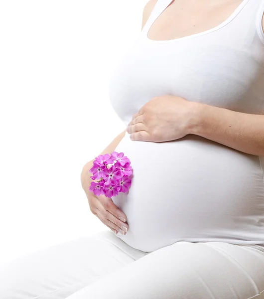 Gravid kvinna röra här magen — Stockfoto