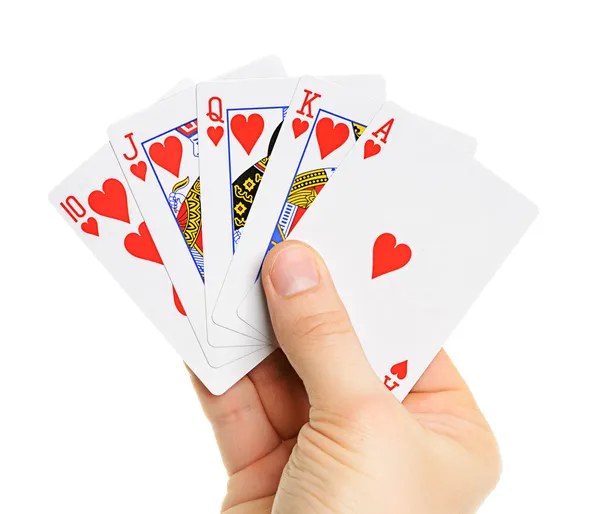 Playing cards in hand Stock Image