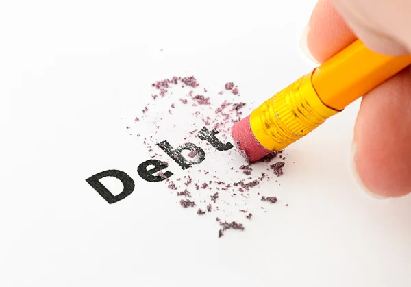 Debt being erased by the end of a pencil — Stock Photo, Image