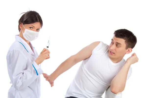 Doctor and man fear of syringe injections phobia — Stock Photo, Image