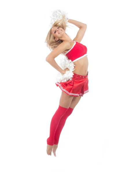 Roztleskávačka tanečnice z cheerleadingu týmu skákání — Stock fotografie