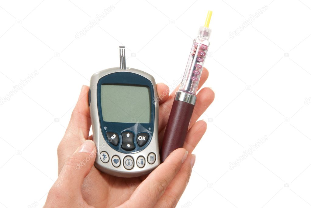 Hands with syringe pen injector and glucometer