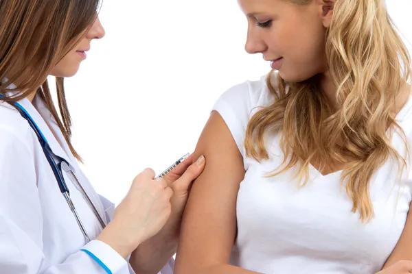 Médico haciendo diabetes paciente insulina vacuna contra la gripe Imagen De Stock