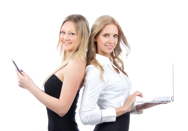 Due donne d'affari con ebook e laptop — Foto Stock