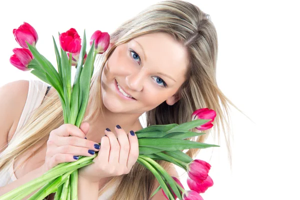 Beautiful woman with red tulips bouquet — Stock Photo, Image