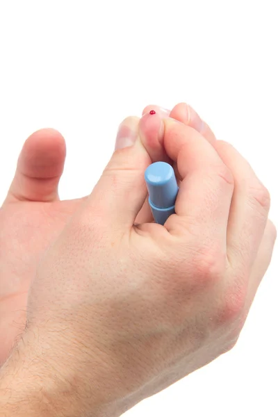 Herif parmağını diyabet kan testi için — Stok fotoğraf