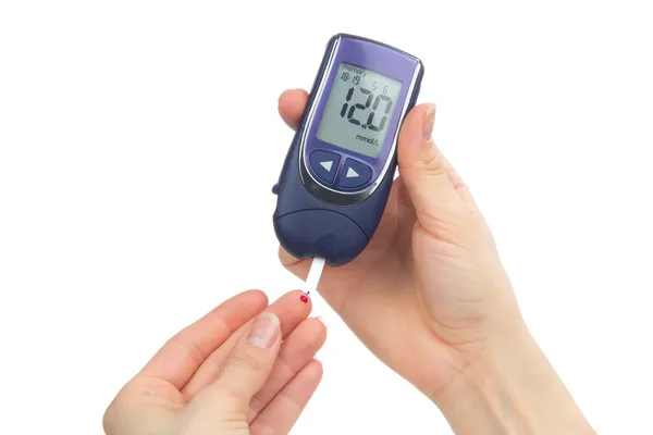 Diabetic patient measuring glucose level blood — Stock Photo, Image