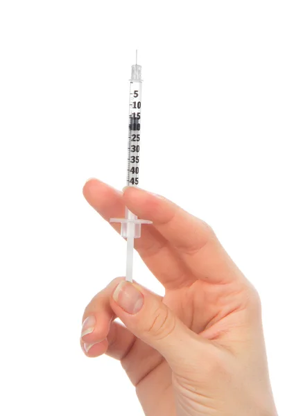 Doktor rukou lékařské inzulinu stříkačkou v ruce — Stock fotografie