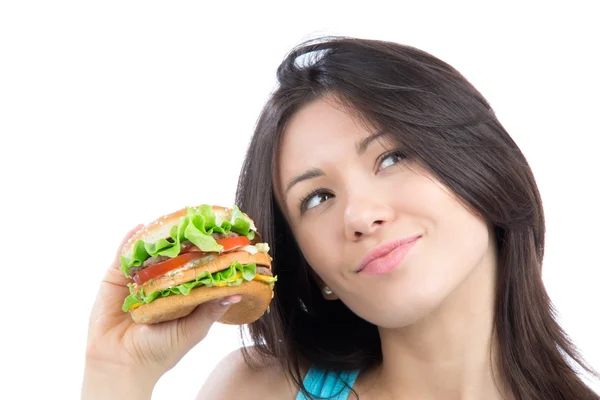 Genç kadın lezzetli lokanta sağlıksız burger — Stok fotoğraf