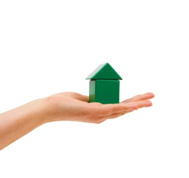 The woman's hand a symbolic energy-efficient house holds. clipart