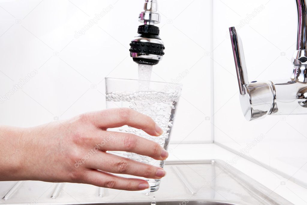 The water is women's hands in the kitchen.