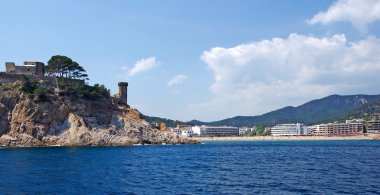 Cityscape of Tossa de Mar view from sea, Costa Brava, Spain. clipart