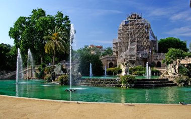 Ciutadell park in centre of Barcelona. Fountain and reconstructi clipart