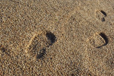 ayak Akdeniz sahilde yazdırır. günbatımı zamanı. fon olarak