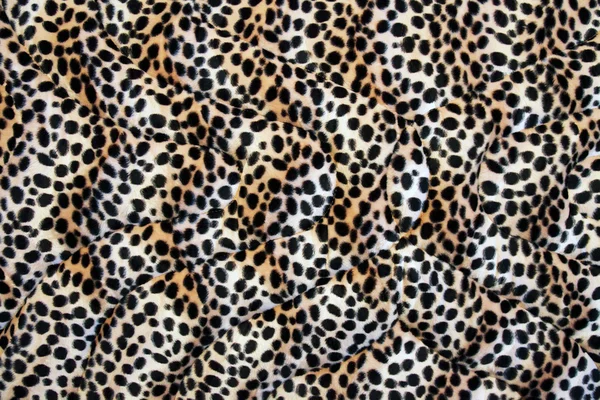 stock image Abstract fabric made leopard cloth as background.