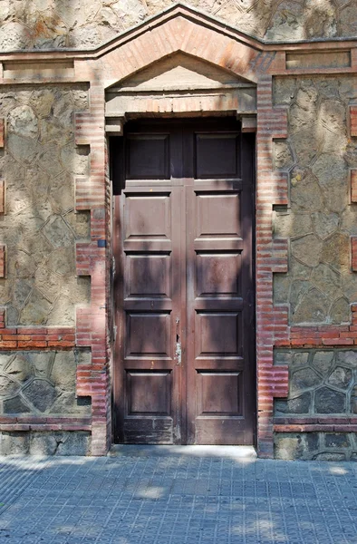 Aged residental door in Lloret de Mar, Spain. — Stock Photo, Image