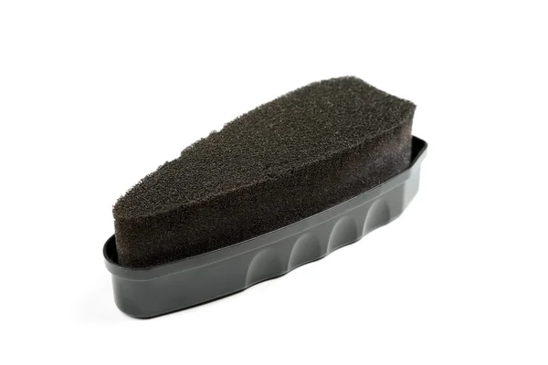 Černá houba pro čištění obuvi izolovaných na bílém pozadí. — Stock fotografie