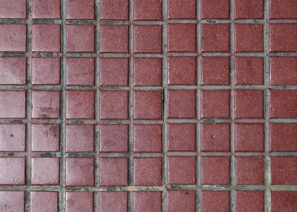 Old red tiled floor. Good as backdrop or background. — Stock Photo, Image