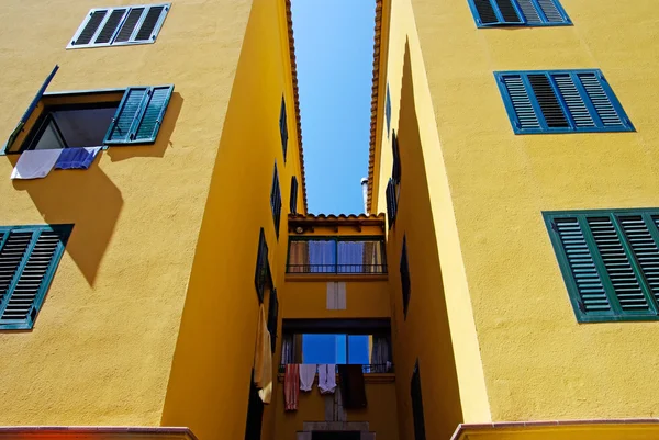 Yellow architecture of small Lloret de Mar city. Costa Brava, Sp — Stock Photo, Image