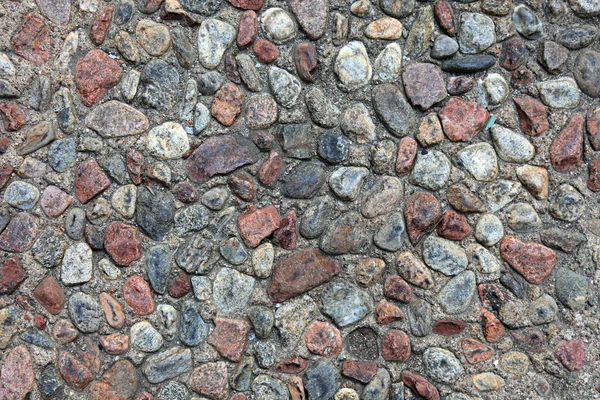Textured pebble sidewalk background. — Stock Photo, Image