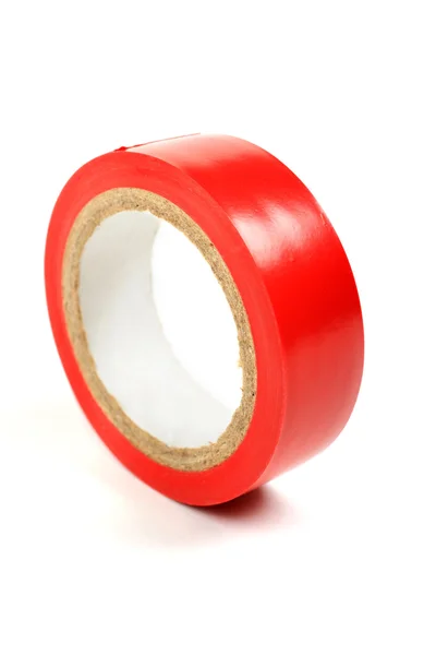 Červená izolační páska izolovaných na bílém pozadí. — Stock fotografie