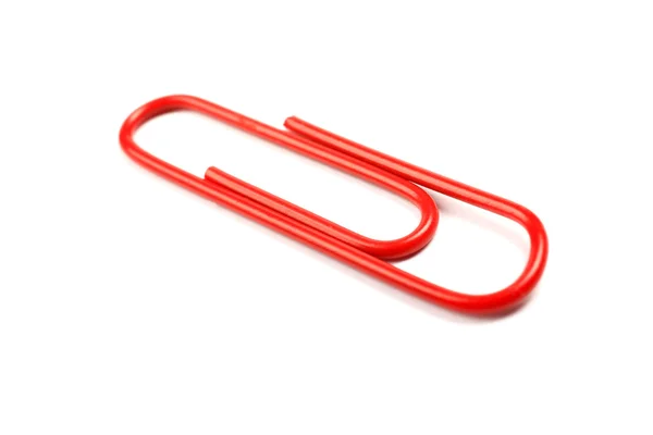 Macro of red paper clip isolated on white background. — Stock Photo, Image