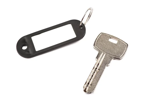Schlüssel und schwarzes Schmuckstück mit Leer für Ihren Designraum isoliert — Stockfoto