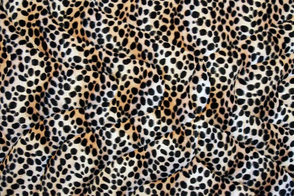 Αφηρημένη ύφασμα κατασκευασμένο ύφασμα λεοπάρδαλη ως φόντο. — Φωτογραφία Αρχείου