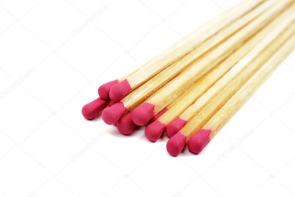 Heap of long wooden matches isolated on white background.