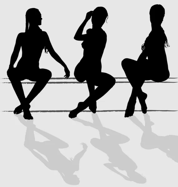 Üç oturan çekici genç kadın siluetleri vektör — Stok Vektör