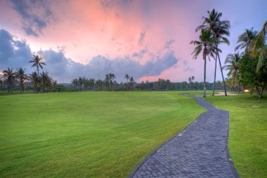 Golf alan günbatımı süre, bali, Endonezya.