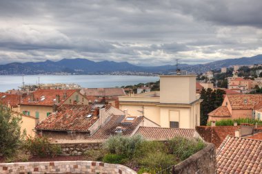 Cannes city in south France. Old Mediterranean village architecture. Travel and tourism to Europe. Old street cityscape of french riviera at sea, residential view. Summer in Provence background. clipart