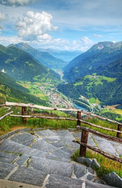 Alpine valley view from peak, Switzerland, Europe. clipart