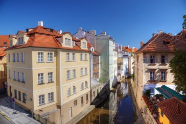 Certovka river in old central Prague. clipart