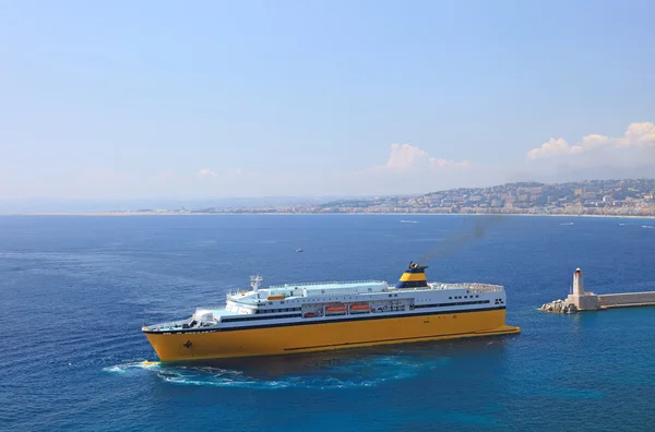 stock image Big yellow cruise ship in port of the city of Nice.